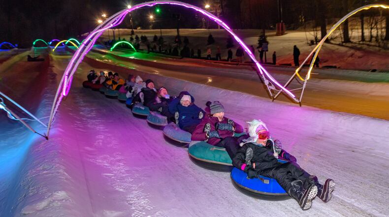 Guests participating in the glow tubing activity at Snow Trails in Mansfield.