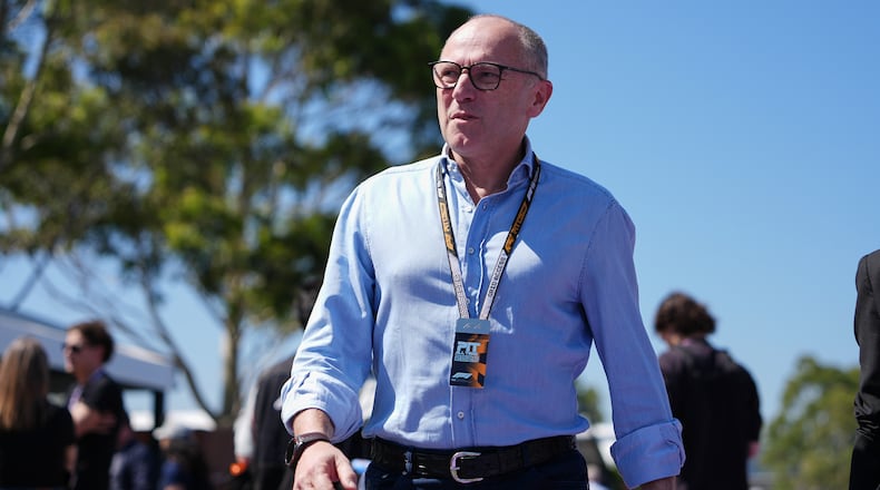 Stefano Domenicali walks down the F1 Paddock ahead of the Australian Formula One Grand Prix at Albert Park, in Melbourne, Australia, Thursday, March 5, 2026. (AP Photo/Asanka Brendon Ratnayake)