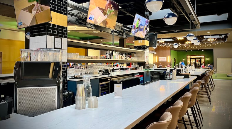 The food court at the former Miami Valley Centre Mall in Piqua has been transformed into The Social at Piqua Center, a dining and entertainment destination. NATALIE JONES/STAFF