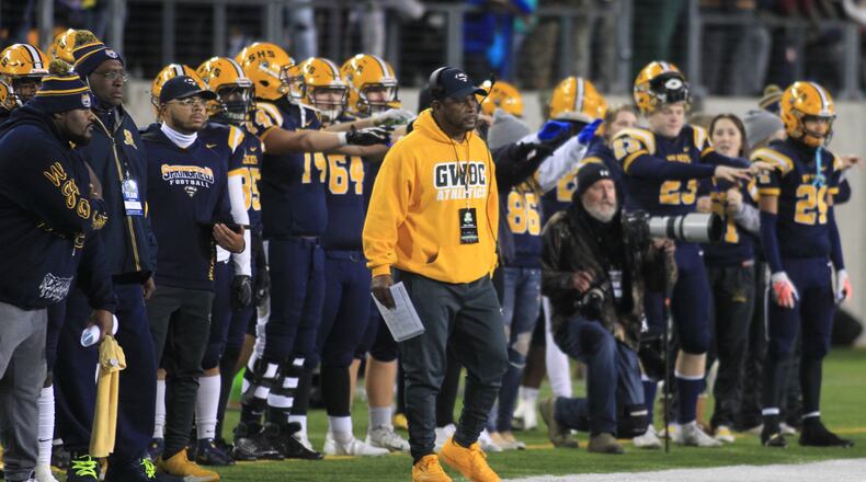 Springfield's Maurice Douglass, center, coaches against St. Edward in the Division I state championship game on Friday, Dec. 3, 2021, at Tom Benson Hall of Fame Stadium in Canton. David Jablonski/Staff