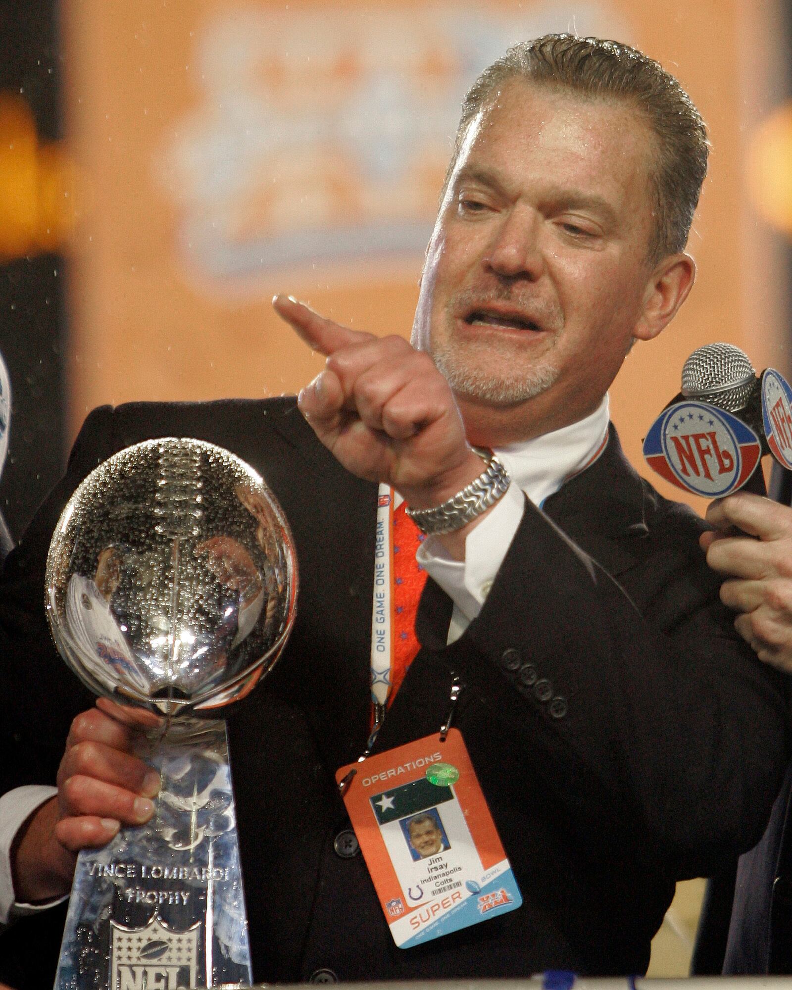 FILE - Indianapolis Colts owner Jim Irsay holds the Vince Lombardi Trophy after the Colts defeated the Chicago Bears 29-17 in the Super Bowl XLI football game at Dolphin Stadium in Miami, Sunday, Feb. 4, 2007. (AP Photo/David J. Phillip, File)