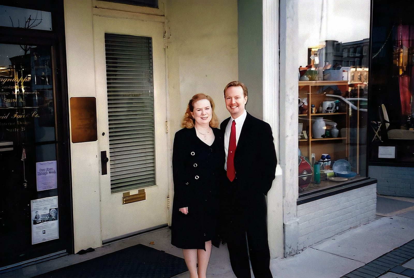 David Fair (R) and wife Marla (L) in front of the newly renovated store front on the SE corner of the Troy public square. This is now the permanent home of the business. CONTRIBUTED