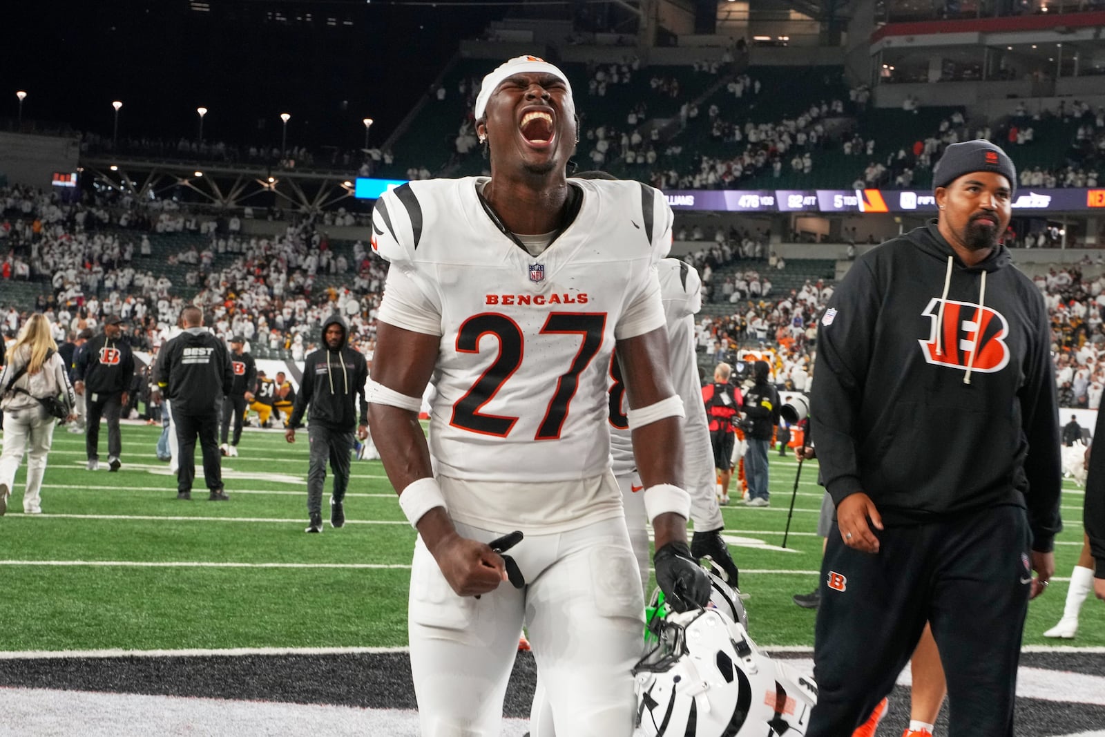 Cincinnati Bengals safety Jordan Battle (27) celebrates as he walks off the field following an NFL football game against the Pittsburgh Steelers in Cincinnati Thursday, Oct. 16, 2025. (AP Photo/Jeff Dean)