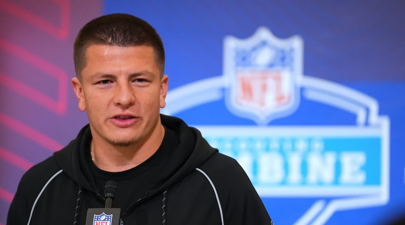 Vanderbilt quarterback Diego Pavia (14) speaks during a news conference at the NFL football scouting combine in Indianapolis, Friday, Feb. 27, 2026. (AP Photo/Julio Cortez)
