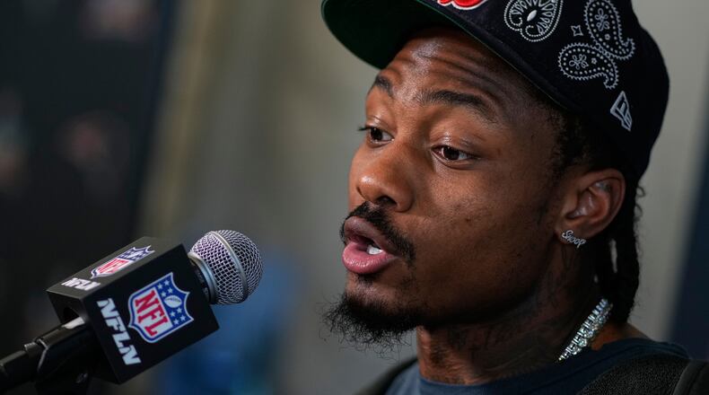 New England Patriots wide receiver Stefon Diggs talks to the media during a news conference Thursday, Feb. 5, 2026, in Santa Clara, Calif., ahead of the Super Bowl 60 NFL football game between the New England Patriots and the Seattle Seahawks. (AP Photo/Charlie Riedel)
