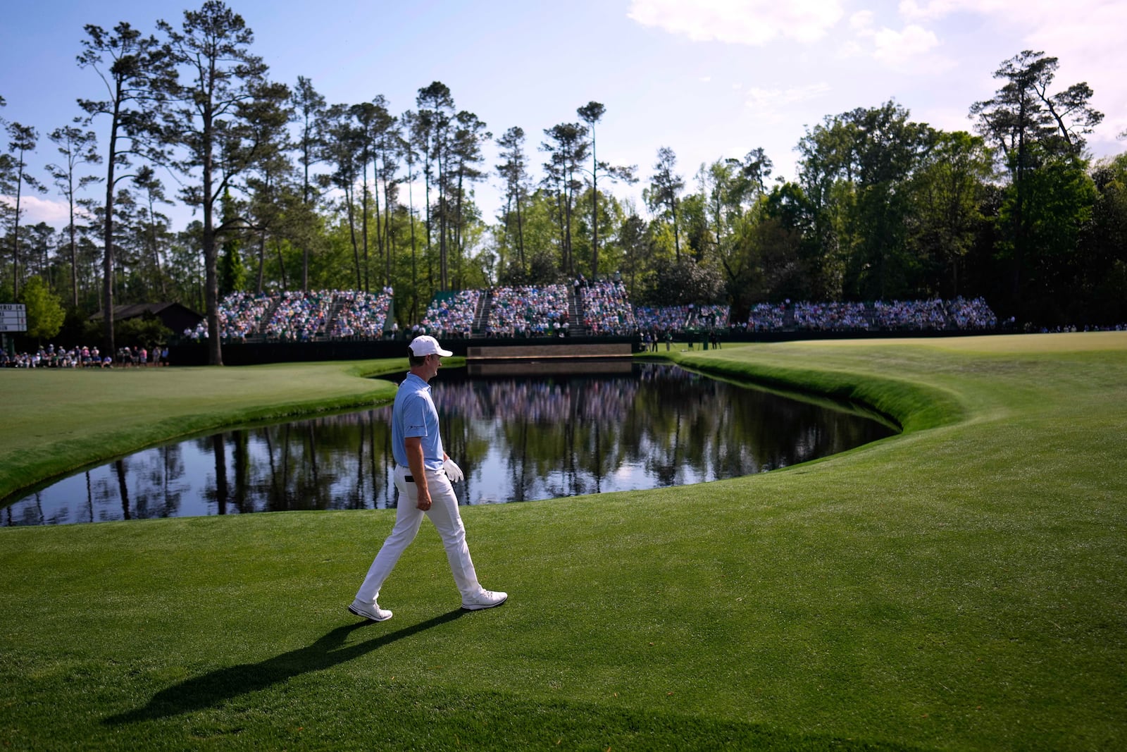 Justin Rose walks to the green on the 15th hole during the first round at the Masters golf tournament, Thursday, April 10, 2025, in Augusta, Ga. (AP Photo/David J. Phillip)