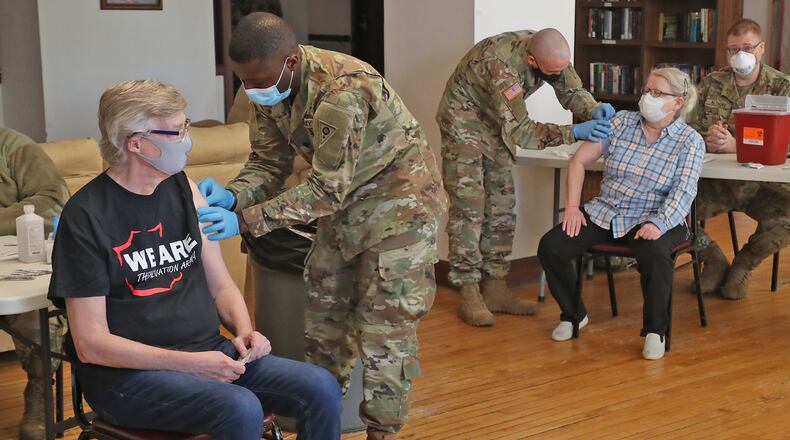 The Clark County Combined Health District is slowly ‘inching up’ to get more vaccinated, but vaccinations in the minority community are still down. Here, National Guard members give senior residents at Shawnee Place Apartments a COVID vaccine shot earlier this year. BILL LACKEY/STAFF