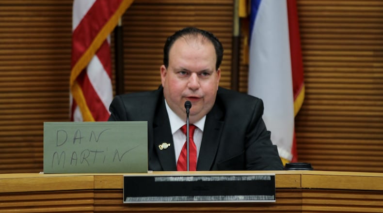 Dan Martin speaks at the CONA candidates night at the City Hall forum last month. MICHAEL COOPER/STAFF