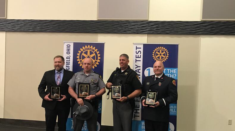 The Springfield Rotary Club awarded four safety force members: Springfield Police Officer Joshua Haytas, Ohio State Highway Patrol Trooper Tim Durham, Springfield Police Division Deputy Joseph Johnson, and Springfield Fire Division Lieutenant Felix Shanahan. CONTRIBUTED