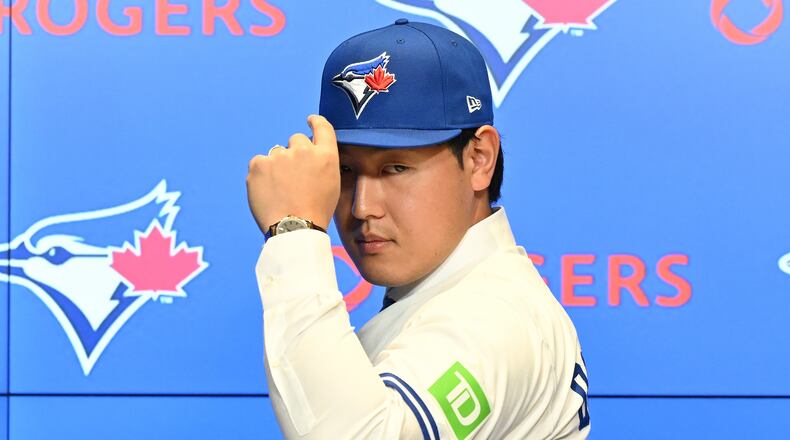 Toronto Blue Jays' Kazuma Okamoto poses during an introductory press conference at Rogers Centre in Toronto, Canada, on Tuesday, Jan. 6, 2026. (Jon Blacker/The Canadian Press via AP)