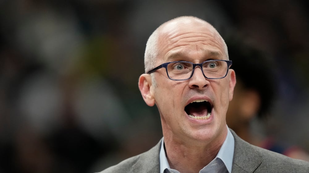 UConn head coach Dan Hurley reacts during the first half of an NCAA college basketball game against Marquette, Saturday, March 7, 2026, in Milwaukee. (AP Photo/Aaron Gash)