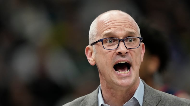 UConn head coach Dan Hurley reacts during the first half of an NCAA college basketball game against Marquette, Saturday, March 7, 2026, in Milwaukee. (AP Photo/Aaron Gash)