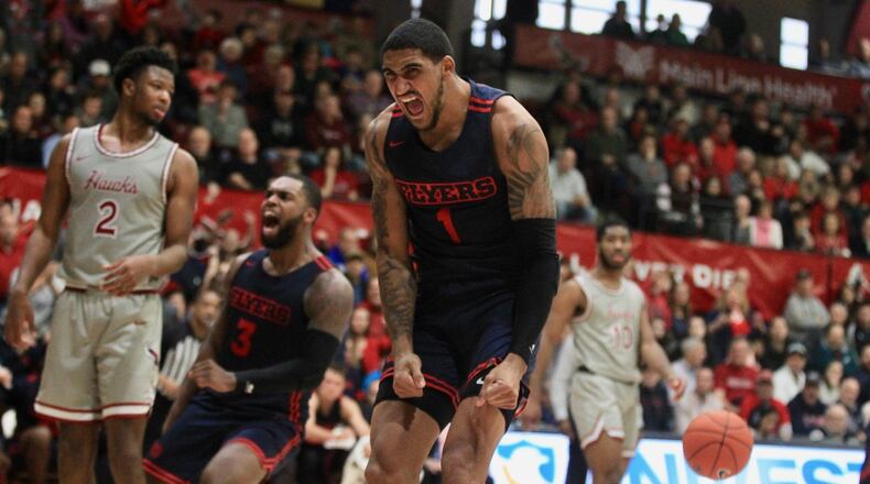 Dayton’s Obi Toppin reacts after a dunk against Saint Joseph’s on Sunday, Jan. 5, 2020, at Hagan Arena in Philadelphia. David Jablonski/Staff