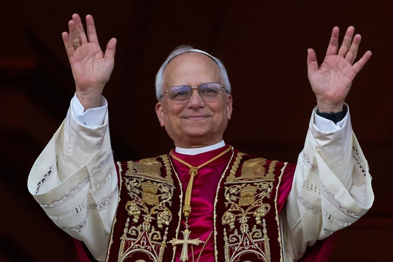 Newly elected Pope Leo XIV appears at the balcony of St. Peter's Basilica at the Vatican, Thursday, May 8, 2025. (AP Photo/Andrew Medichini)