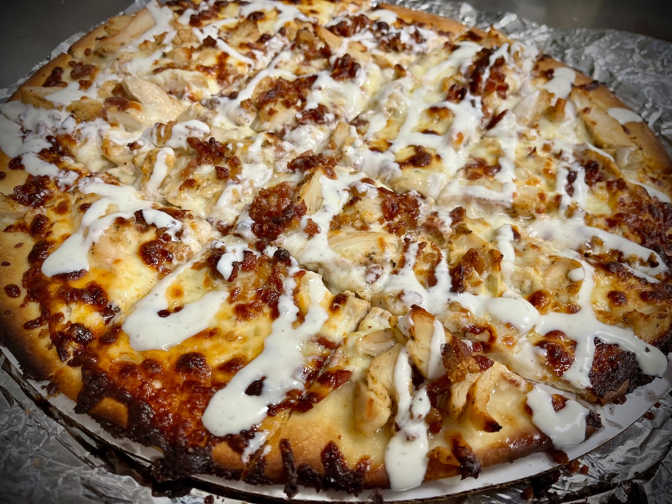 The Top Hat Pizza & More