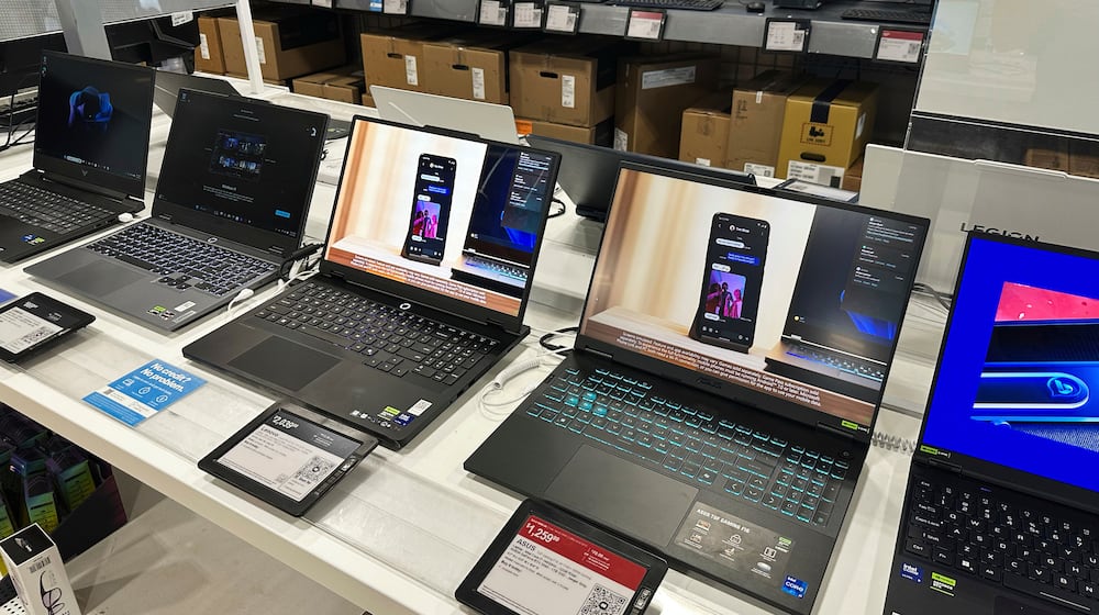 FILE - Laptop computers are displayed at a retail store in Vernon Hills, Ill., Thursday, Aug. 7, 2025. (AP Photo/Nam Y. Huh, File)