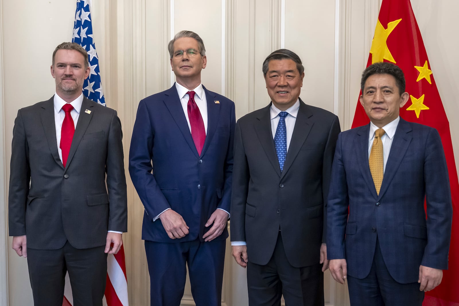 U.S. Secretary of the Treasury Scott Bessent, center left, U.S. Trade Representative Jamieson Greer, left, Chinese Vice Premier He Lifeng, center right, and Chinese ambassador to the World Trade Organization Li Chenggang, right, pose for a photo during a bilateral meeting between the United States and China, in Geneva, Switzerland, on Saturday, May 10, 2025. (Martial Trezzini/Keystone via AP)