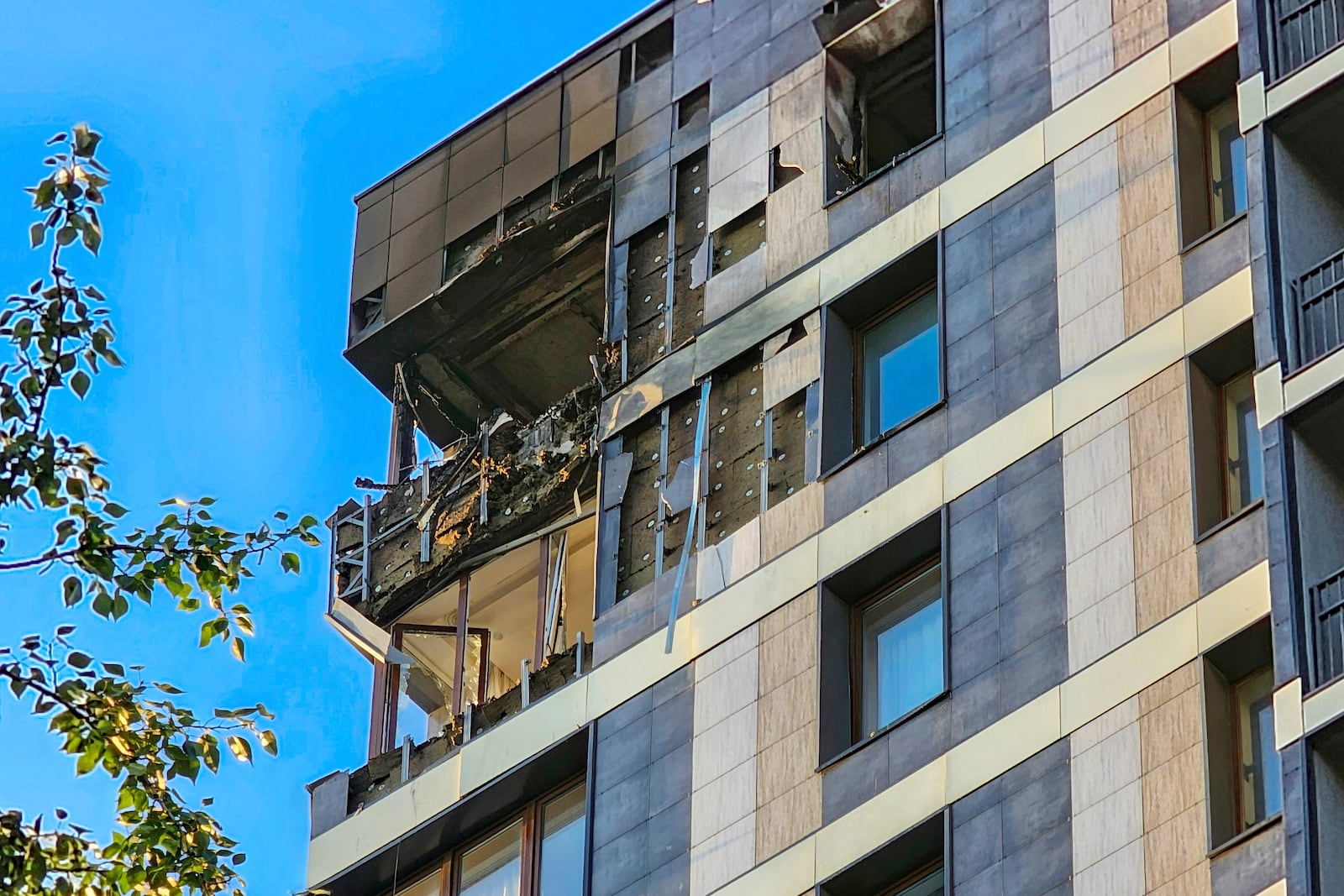 A view of the damaged flat of an apartment building where the Ukrainian drone fell in Krasnogorsk, just outside Moscow, Russia, on Tuesday, June 24, 2025. (Moscow News Agency via AP)