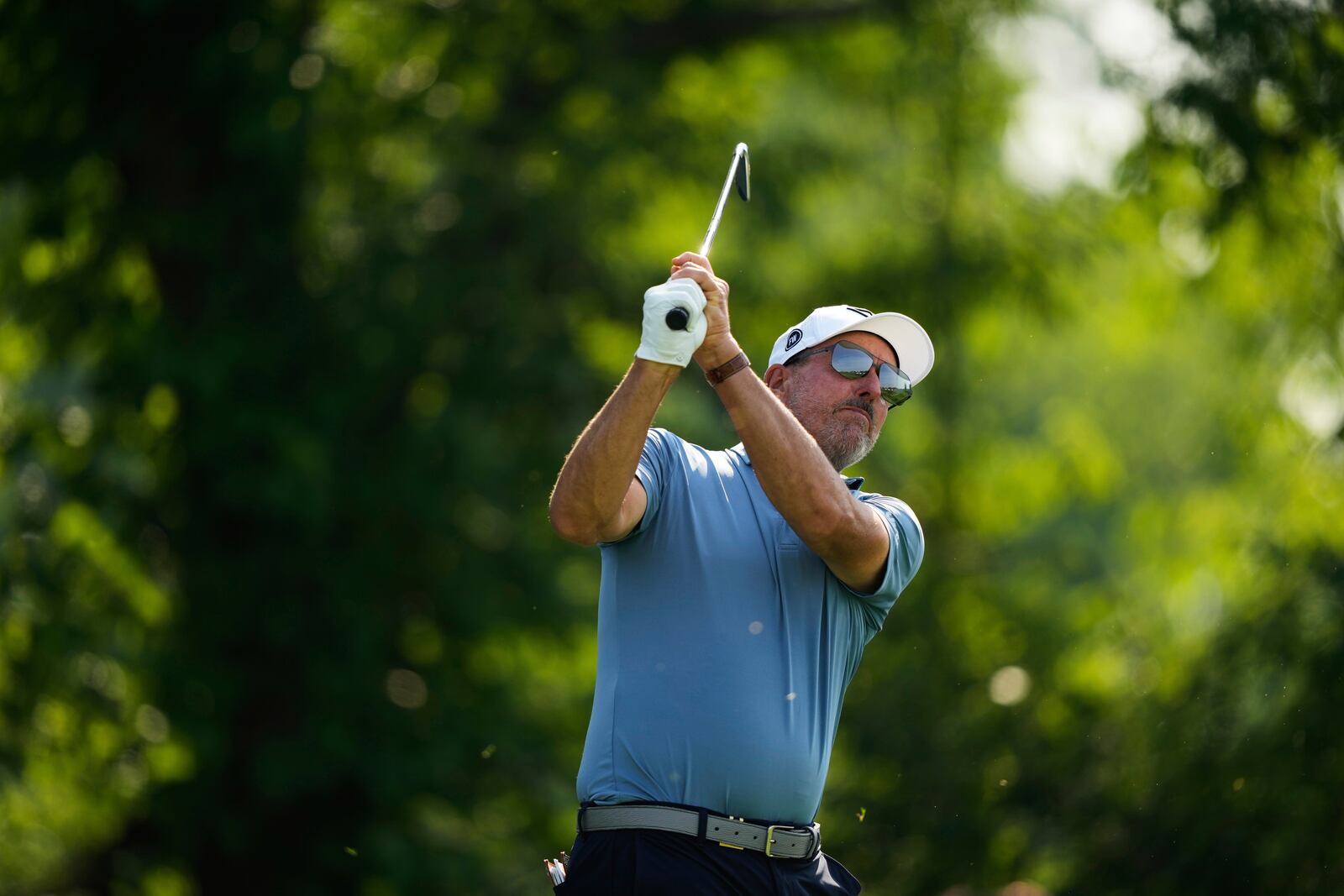 Phil Mickelson tees off on the 13th hole during the first round of the U.S. Open golf tournament at Oakmont Country Club Thursday, June 12, 2025, in Oakmont, Pa. (AP Photo/Carolyn Kaster)