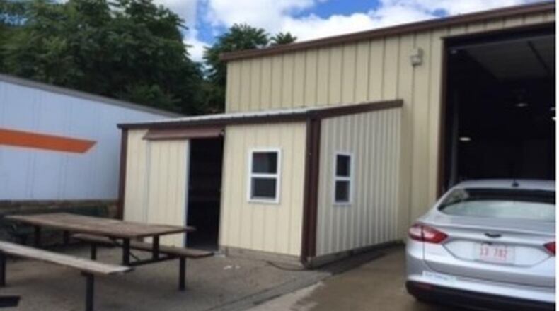 State workers used inmate labor to do discounted car repairs, drive across the state to fetch personal tanning bed and build an unauthorized smoke shack for a state supervisor, a report released Thursday shows. This photo shows the outside of the smoke shack.