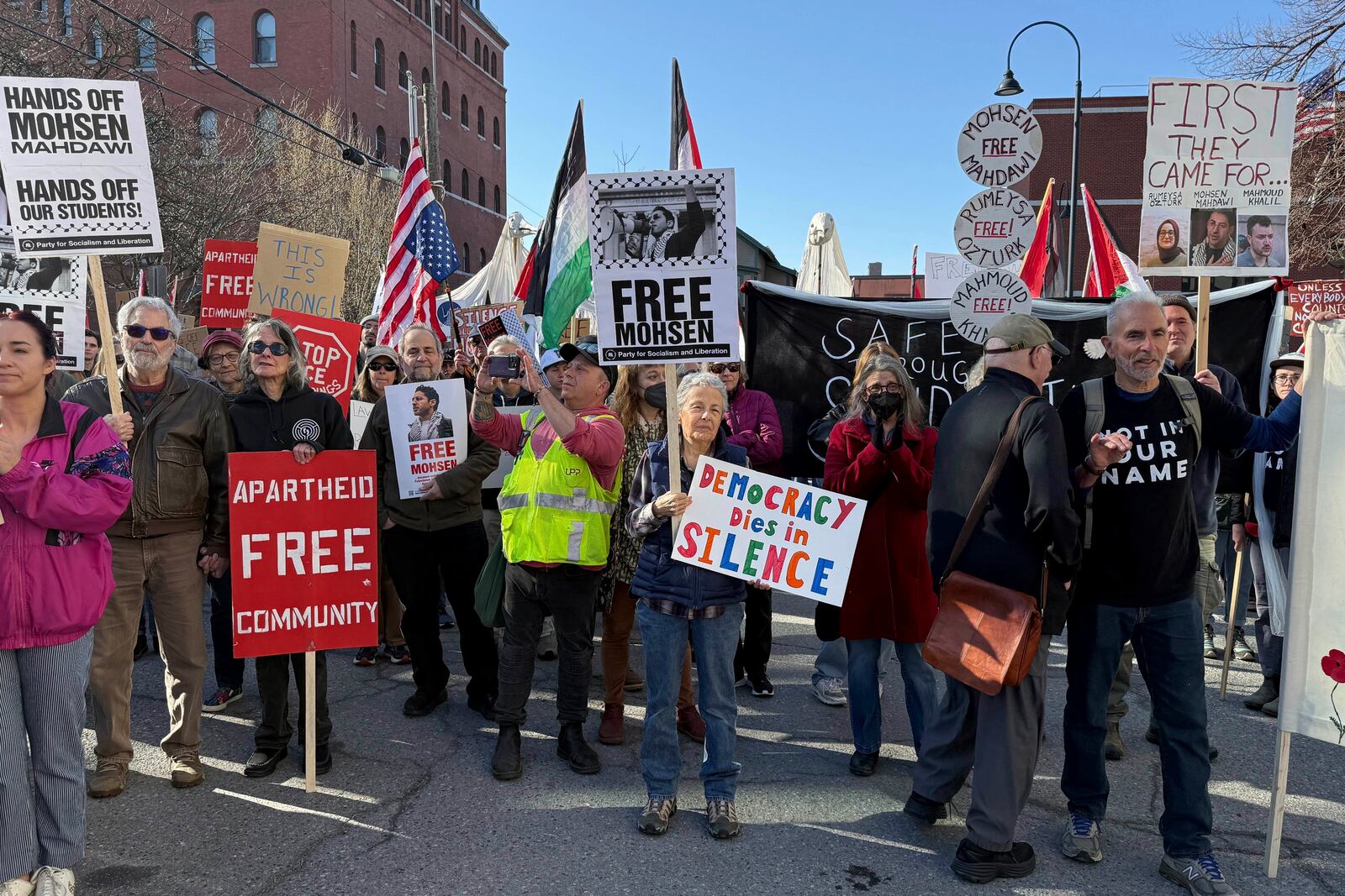 Protesters gather outside federal court ahead of a hearing for Mohsen Mahdawi, a Palestinian man arrested at a Vermont immigration office during an interview about finalizing his U.S. citizenship and a legal permanent resident who led protests against the war in Gaza at Columbia University, Wednesday, April 23, 2025 in Burlington, Vt. (AP Photo/Amanda Swinhart)