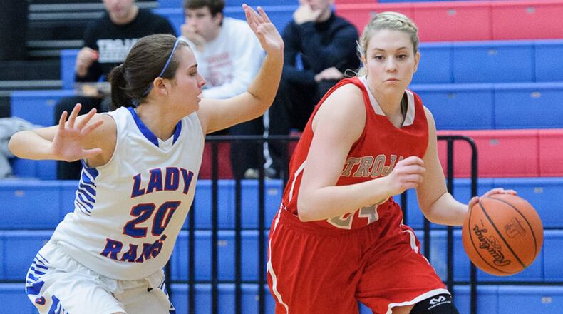 Southeastern senior forward Jessica Erwin (dribbles with pressure from Greeneview’s Sabrina Saunders. Erwin was named second team All-Ohio. Contributed Photo by Bryant Billing