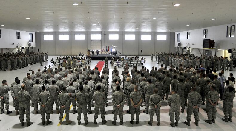 Local guardsmen stand for a ceremony at the Springfield Air National Guard Base in an April 2016 file photo. Staff file photo by Bill Lackey