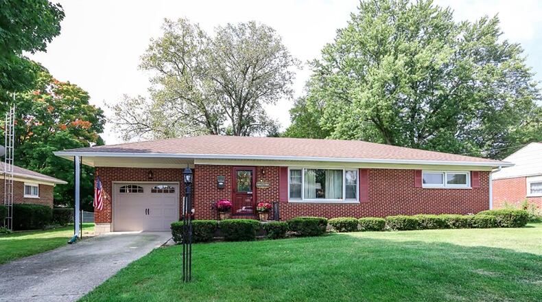 The 3-bedroom home, which has about 1,250 sq. ft. of living space, boasts a full, semi-finished basement. The property includes an attached garage and carport. CONTRIBUTED PHOTO