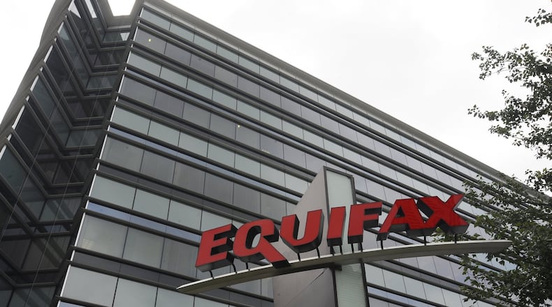 This July 21, 2012, photo shows Equifax Inc., offices in Atlanta. Credit monitoring company Equifax says a breach exposed social security numbers and other data from about 143 million Americans. The Atlanta-based company said Thursday, Sept. 7, 2017, that “criminals” exploited a U.S. website application to access files between mid-May and July of this year. (AP Photo/Mike Stewart)