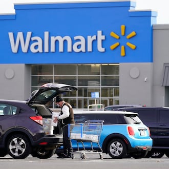 Walmart Plus members get free delivery on orders more than $55. AP FILE