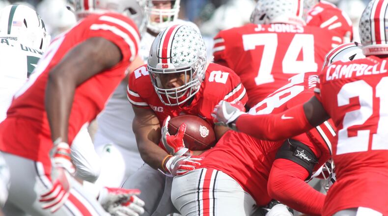 Ohio States J.K. Dobbins runs against Michigan State on Saturday, Nov. 11, 2017, at Ohio Stadium in Columbus. David Jablonski/Staff