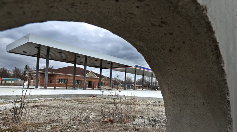 A Marathon gas station sits partially finished at the intersection of U.S. 40 and Ohio Route 235 Wednesday. BILL LACKEY/STAFF