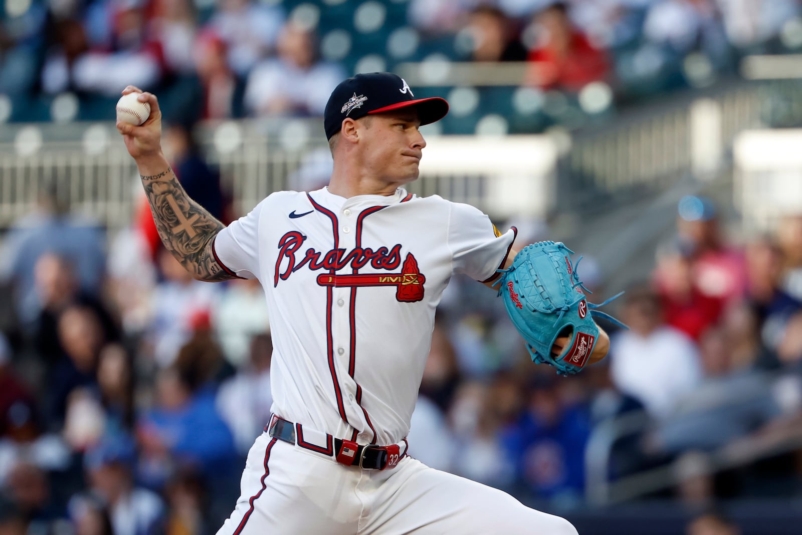Atlanta Braves pitcher AJ Smith-Shawver throws during the first inning of a baseball game against the Cincinnati Reds, Monday, May 5, 2025, in Atlanta. (AP Photo/Butch Dill)