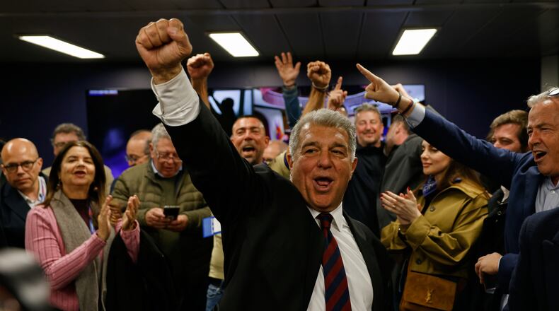 Candidate, Joan Laporta reacts during early voting projections for the election to be president of FC Barcelona soccer club in Barcelona, Spain, Sunday, March 15, 2026. (AP Photo/Joan Monfort)