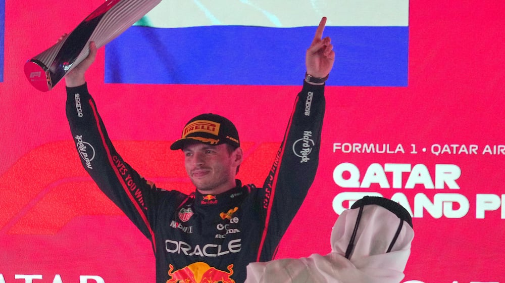 Red Bull driver Max Verstappen of the Netherlands celebrates after winning the Qatar Formula One Grand Prix, in Lusail, Qatar, Sunday, Nov. 30, 2025.(AP Photo/Altaf Qadri)