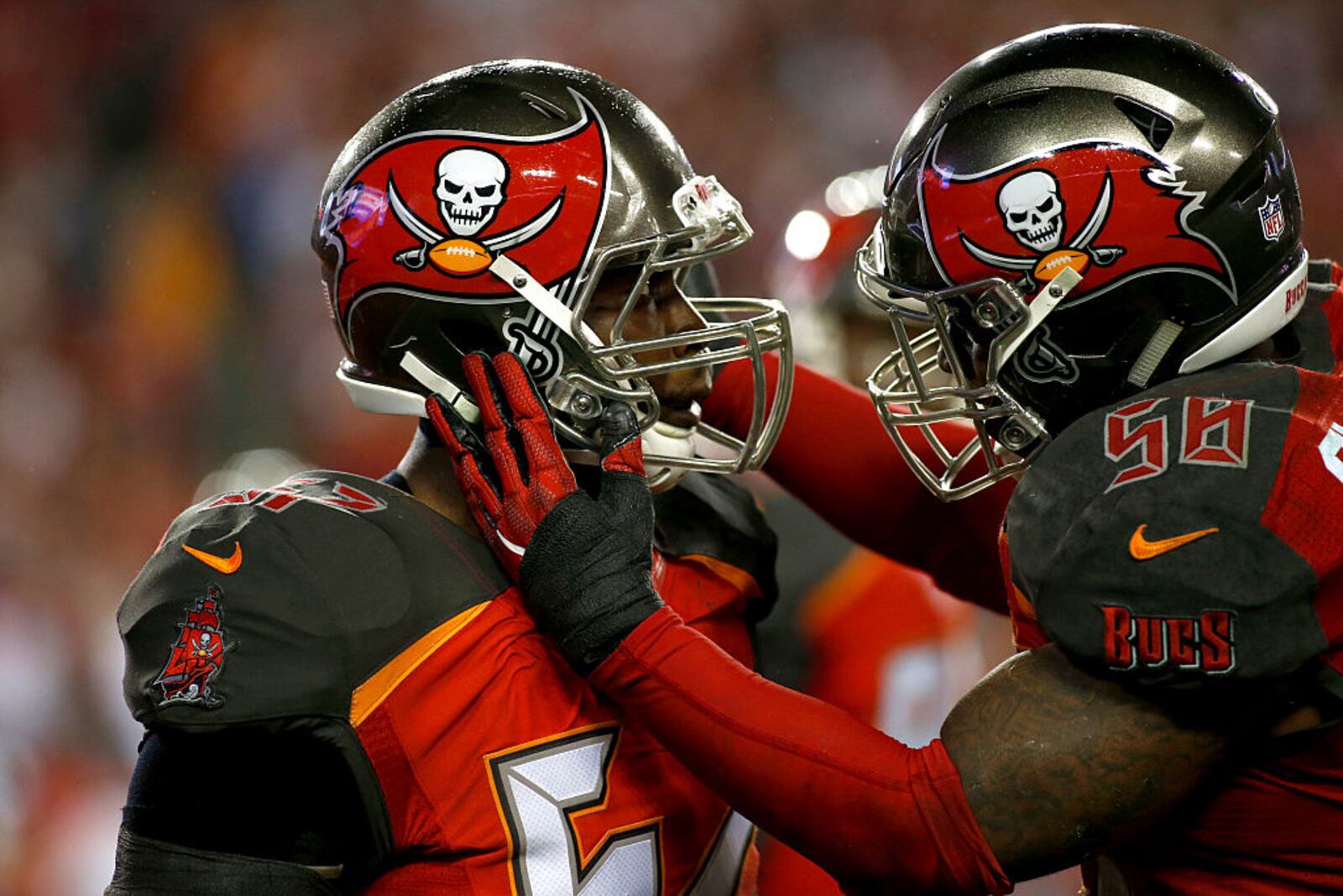 TAMPA, FL - DECEMBER 11: Defensive end Noah Spence #57 of the Tampa Bay Buccaneers celebrates with middle linebacker Kwon Alexander #58 after breaking up a pass by quarterback Drew Brees of the New Orleans Saints during the fourth quarter of an NFL game on December 11, 2016 at Raymond James Stadium in Tampa, Florida. (Photo by Brian Blanco/Getty Images)