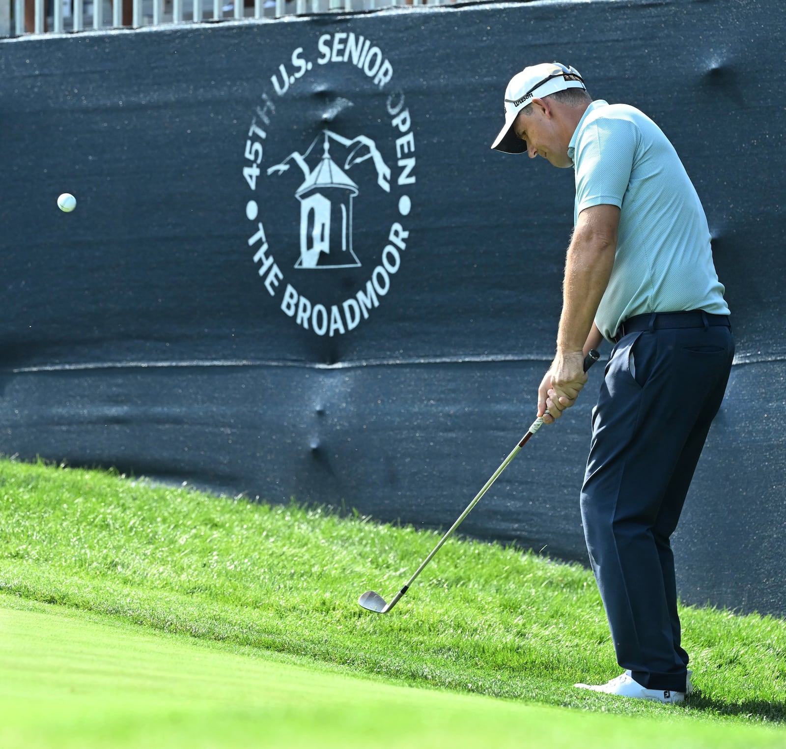 Padraig Harrington hits onto the green on the 10th hole on the first day at the U.S. Senior Open Championship at Broadmoor Golf Club in Colorado Springs, Colo., Thursday, June 26, 2025. (Jerilee Bennett/The Gazette via AP)