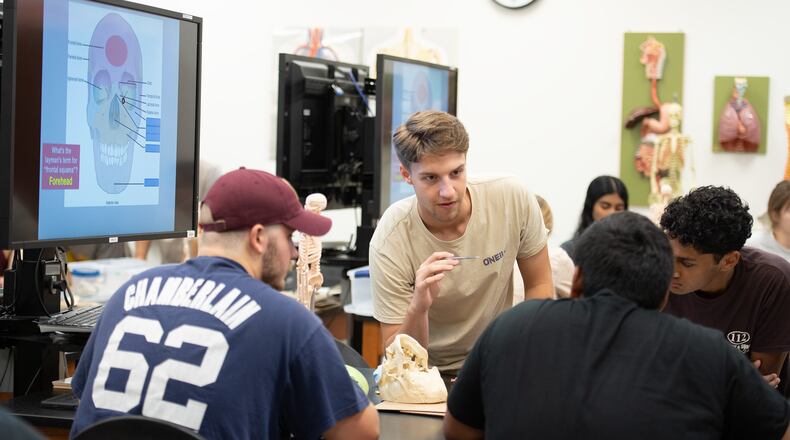 Biology students work in a lab at Cedarville University. Contributed Photo by Scott Huck