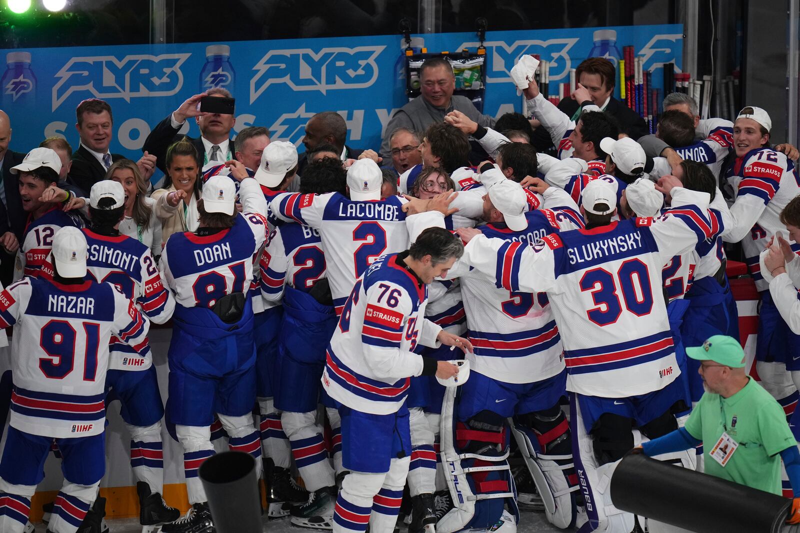 Team USA celebrates after winning the final match between United States and Switzerland at the ice hockey world championships in Stockholm, Sweden, Sunday, May 25, 2025. (AP Photo/Petr David Josek)