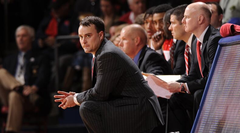 Dayton head coach Archie Miller watches the action against Weber St at UD Arena earlier this season. Miller and his staff have made inroads recruiting the Chicagoland area. Two of the three UD recruits for 2013 are from Chicago. FILE PHOTO