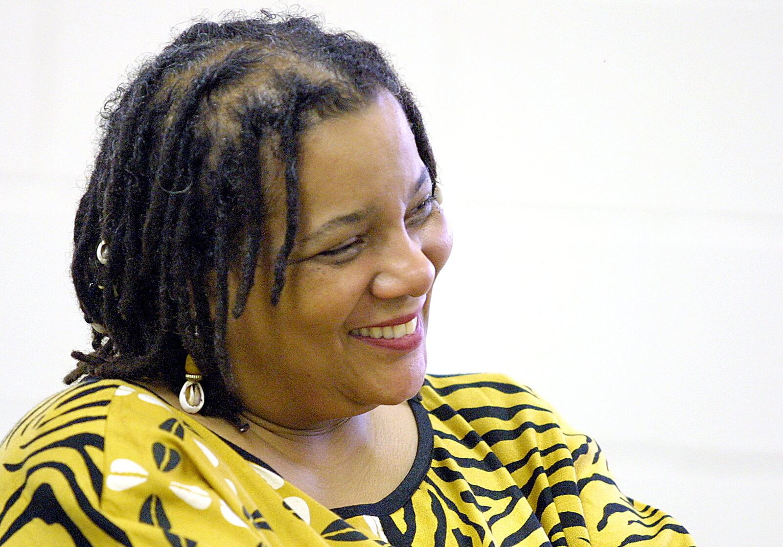 Director and actress Sheila Ramsey laughs as she listens to one of her workshop students tell a life story during a workshop at the Playwrights Festival in 2001. CONTRIBUTED