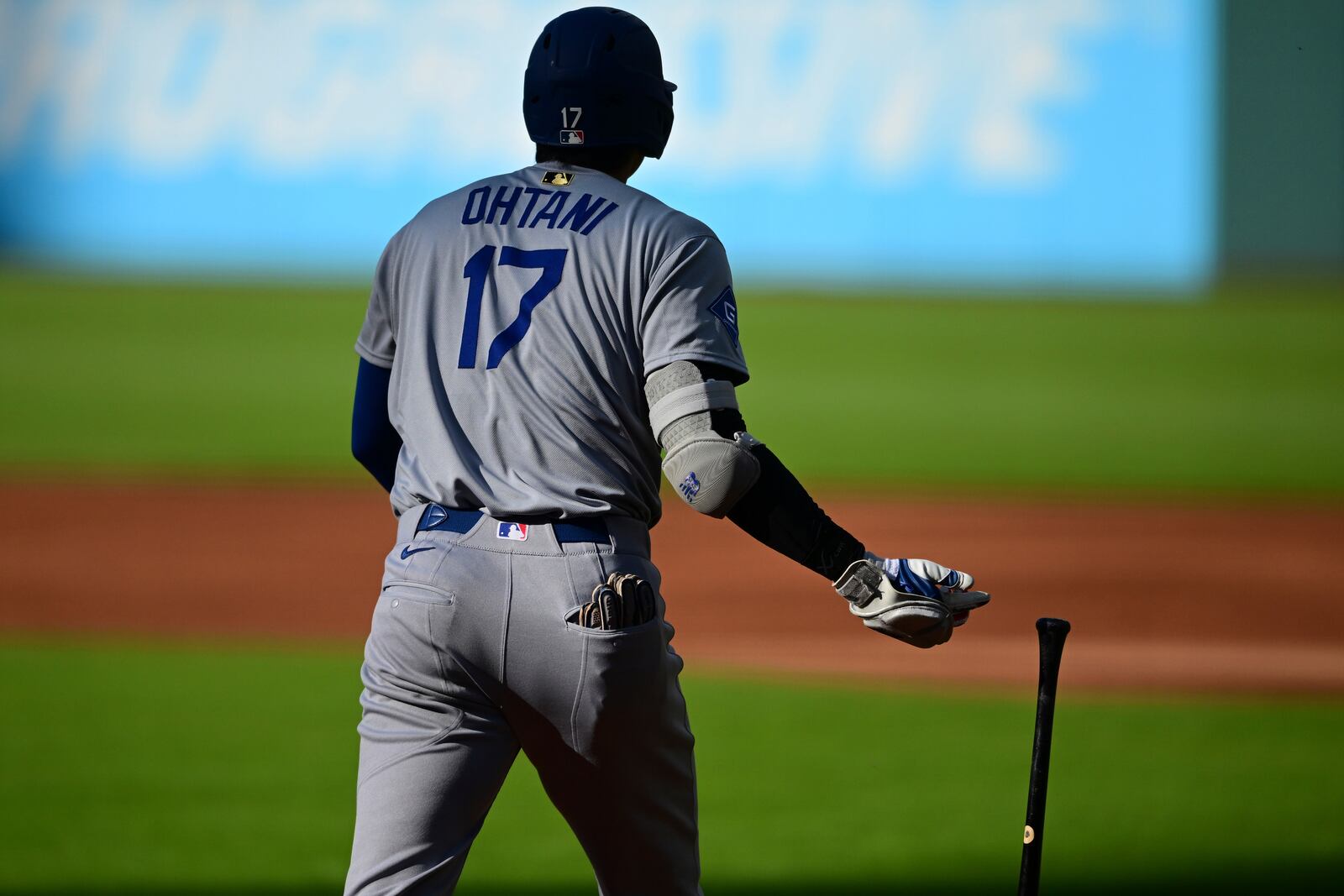 Los Angeles Dodgers' Shohei Ohtani watches his solo home run off Cleveland Guardians starting pitcher Gavin Williams during the first inning of a baseball game, Monday May 26, 2025, in Cleveland. (AP Photo/David Dermer)