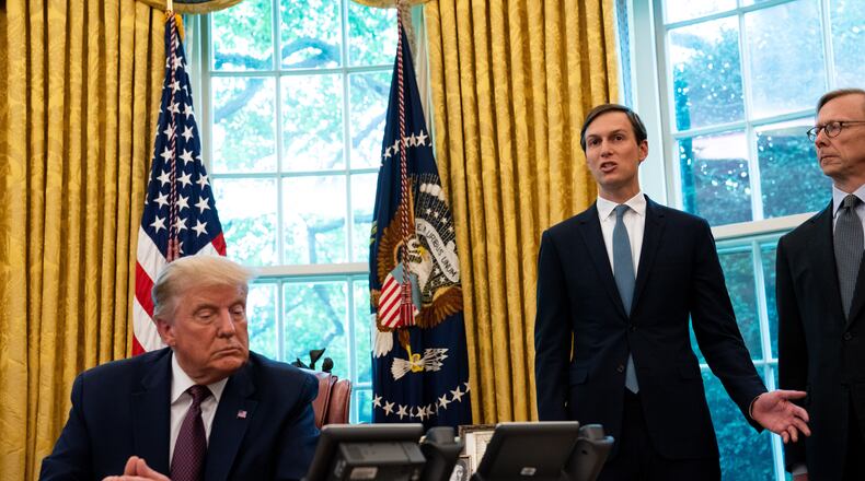 President Donald Trump with Jared Kushner, a senior White House adviser, in the Oval Office of the White House in Washington, Oct. 20, 2020. With far less money than anticipated, campaign officials are scrambling to address a severe financial disadvantage against Joe Biden, producing something of an internal blame game. (Anna Moneymaker/The New York Times)