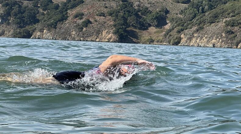 Amy Wamsley, 49, of Yellow Springs, during a 6-hour swim underneath the Golden Gate Bridge in October 2024. Wamsley will attempt to swim the English Channel this June. CONTRIBUTED