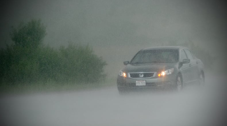 This file photo shows heavy rain in the Fairborn area. MARSHALL GORBY\STAFF