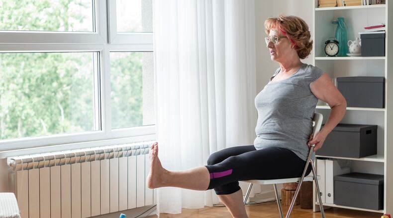 Every half hour or so, stand up and stretch. Just the act of going from a seated to a standing position helps to strengthen the lower body, increase circulation and provide a well needed stretch to shortened muscles. iSTOCK/COX