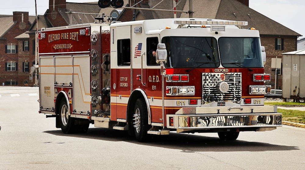 An engine from Oxford Fire Department pulls out of their headquarters on S. Elm Street Monday, March 13, 2023. The Ohio legislature is putting $40 million in cash into a state fund that promises direct financial help for firefighters, police and EMS first responders who suffer from a post traumatic stress injury. NICK GRAHAM/STAFF