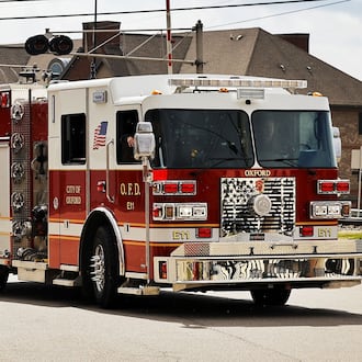 An engine from Oxford Fire Department pulls out of their headquarters on S. Elm Street Monday, March 13, 2023. The Ohio legislature is putting $40 million in cash into a state fund that promises direct financial help for firefighters, police and EMS first responders who suffer from a post traumatic stress injury. NICK GRAHAM/STAFF