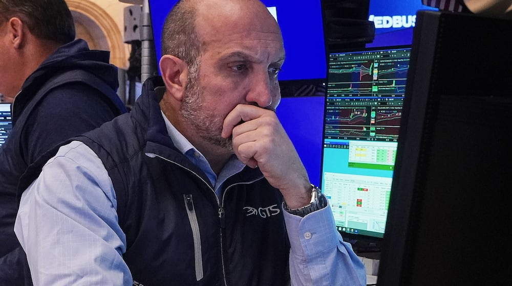 Specialist James Denaro works at his post on the floor of the New York Stock Exchange, Thursday, Jan. 8, 2026. (AP Photo/Richard Drew)