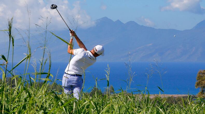 FILE - Justin Thomas hits from the seventh tee during the first round of the Tournament of Champions golf tournament at Kapalua Plantation Course on Kapalua, Hawaii, Jan. 7, 2016. (AP Photo/Matt York, File)